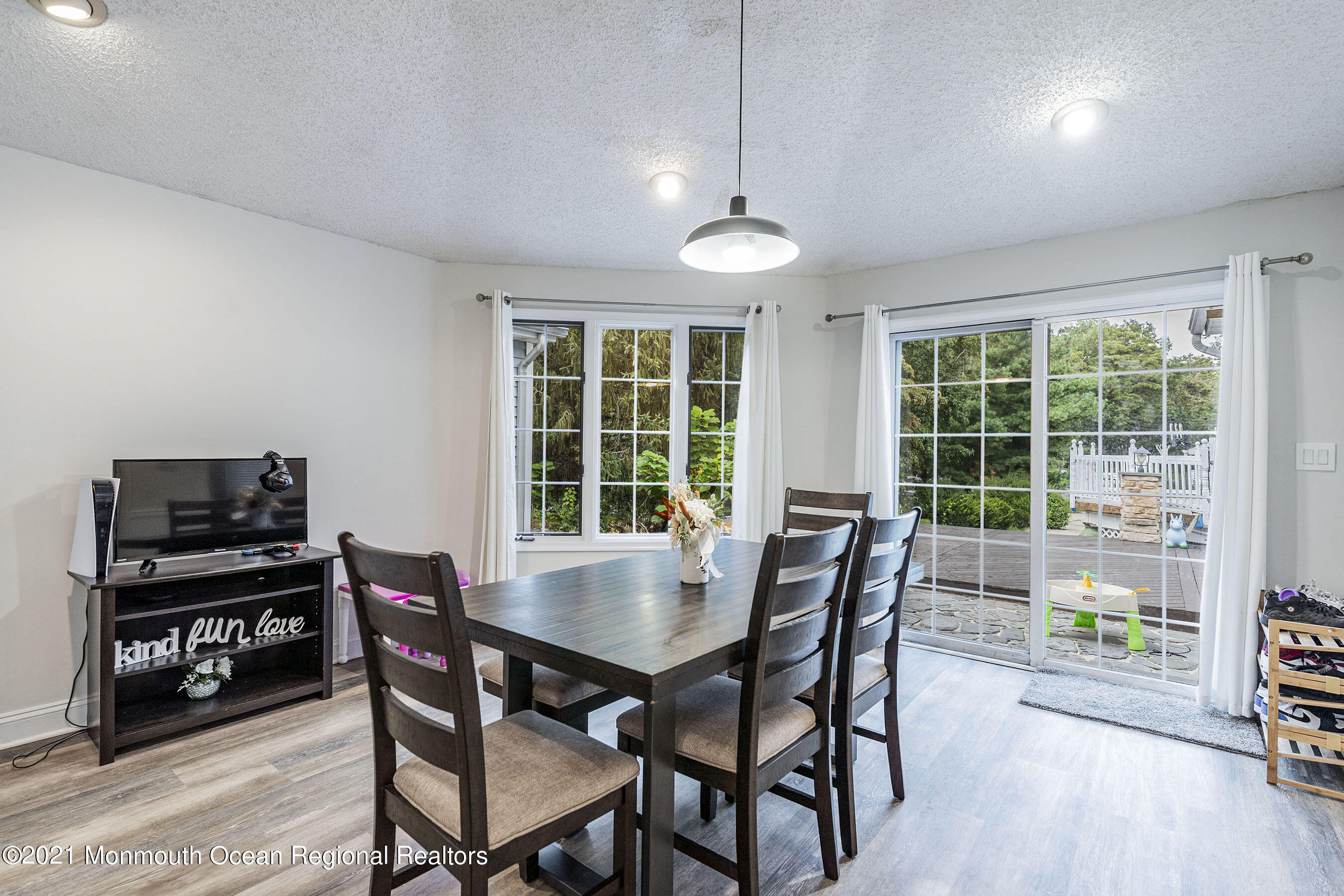 49 South Cooks Bridge Road Jackson, NJ 08527 - Photo 8 of 43 a view of a dining room with furniture window and wooden floor