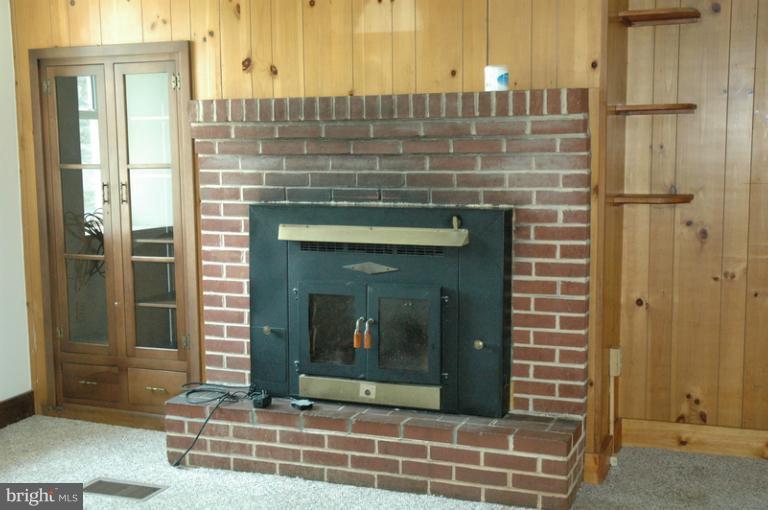 8302 Mapleville Road Mount Airy, MD 21771 - Photo 13 of 21 a view of a house with a door