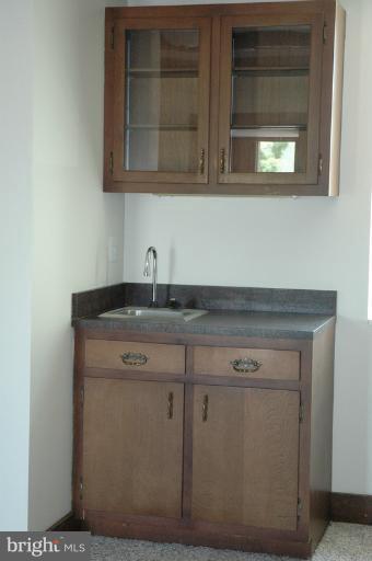 8302 Mapleville Road Mount Airy, MD 21771 - Photo 15 of 21 a utility room with a sink