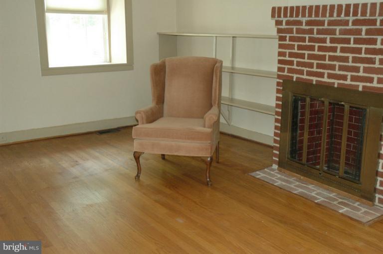 8302 Mapleville Road Mount Airy, MD 21771 - Photo 20 of 21 a view of a room with wooden floor and windows
