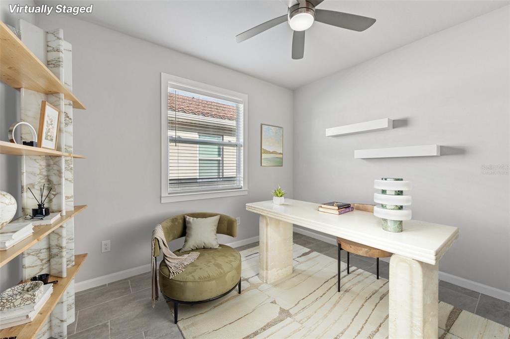 20280 Concerto Place Venice, FL 34293 - Photo 23 of 37 a living room with furniture and a wooden floor