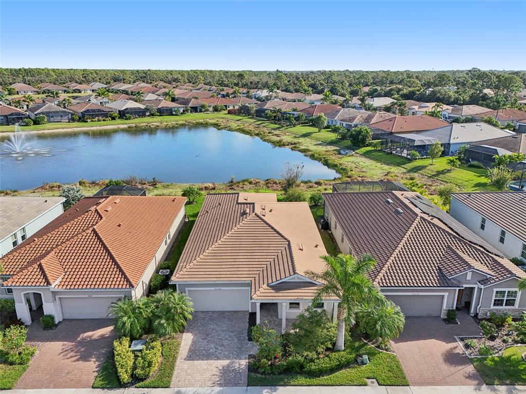 20280 Concerto Place Venice, FL 34293 - Photo 28 of 37 an aerial view of residential houses with outdoor space and river