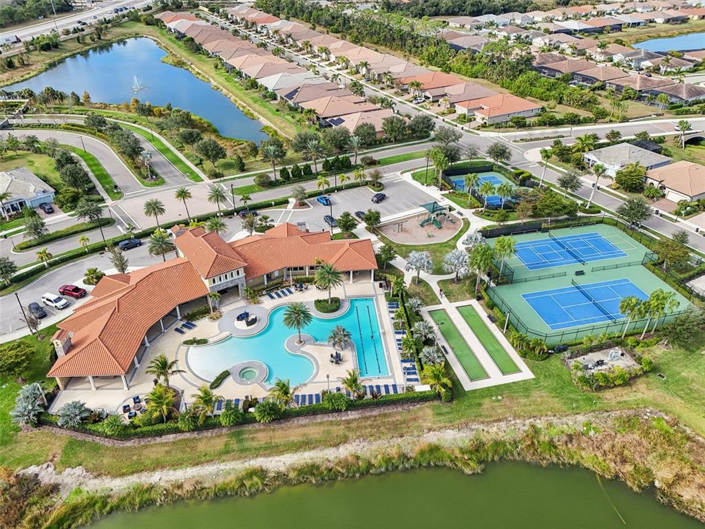 20280 Concerto Place Venice, FL 34293 - Photo 36 of 37 an aerial view of residential houses with outdoor space