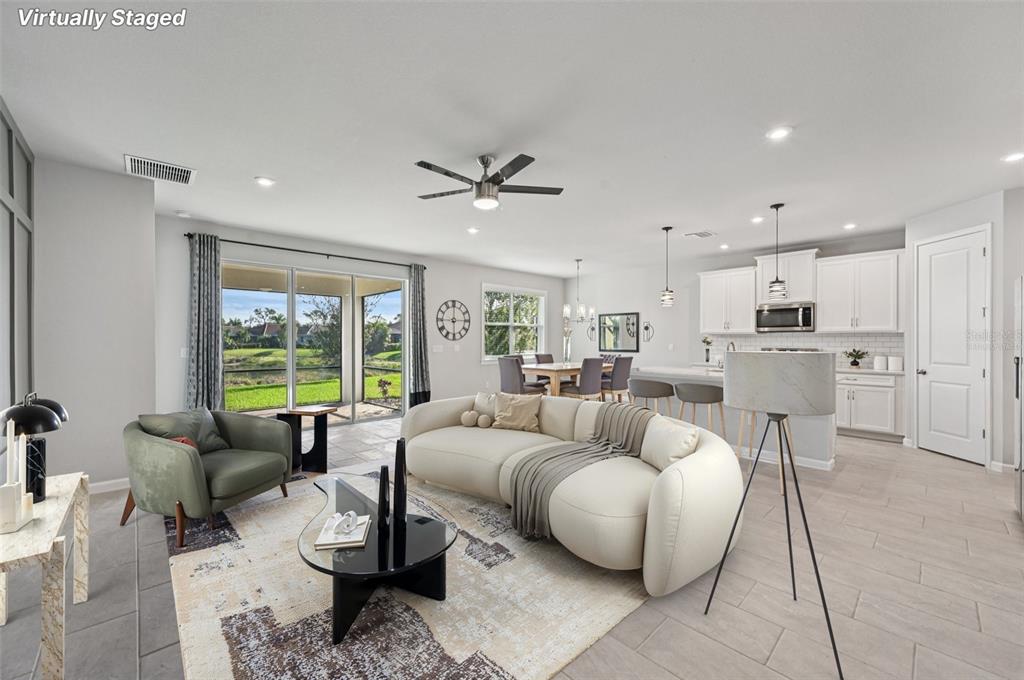 20280 Concerto Place Venice, FL 34293 - Photo 5 of 37 a living room with furniture and a large window