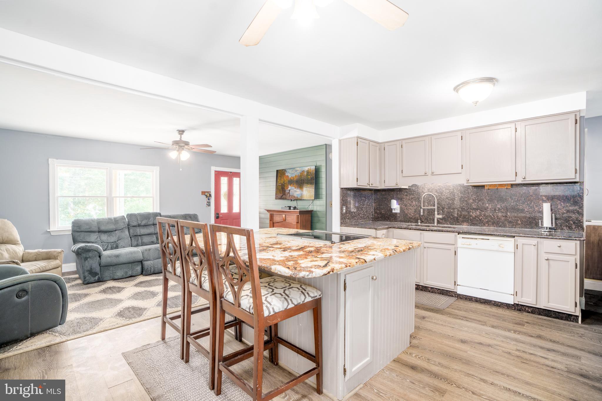 Kitchen with island opening into the family room