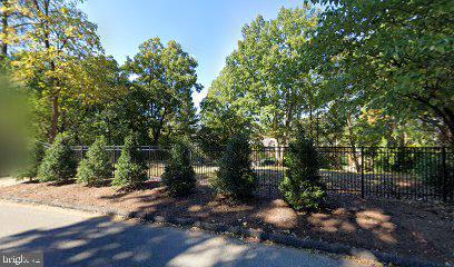 a view of backyard with green space