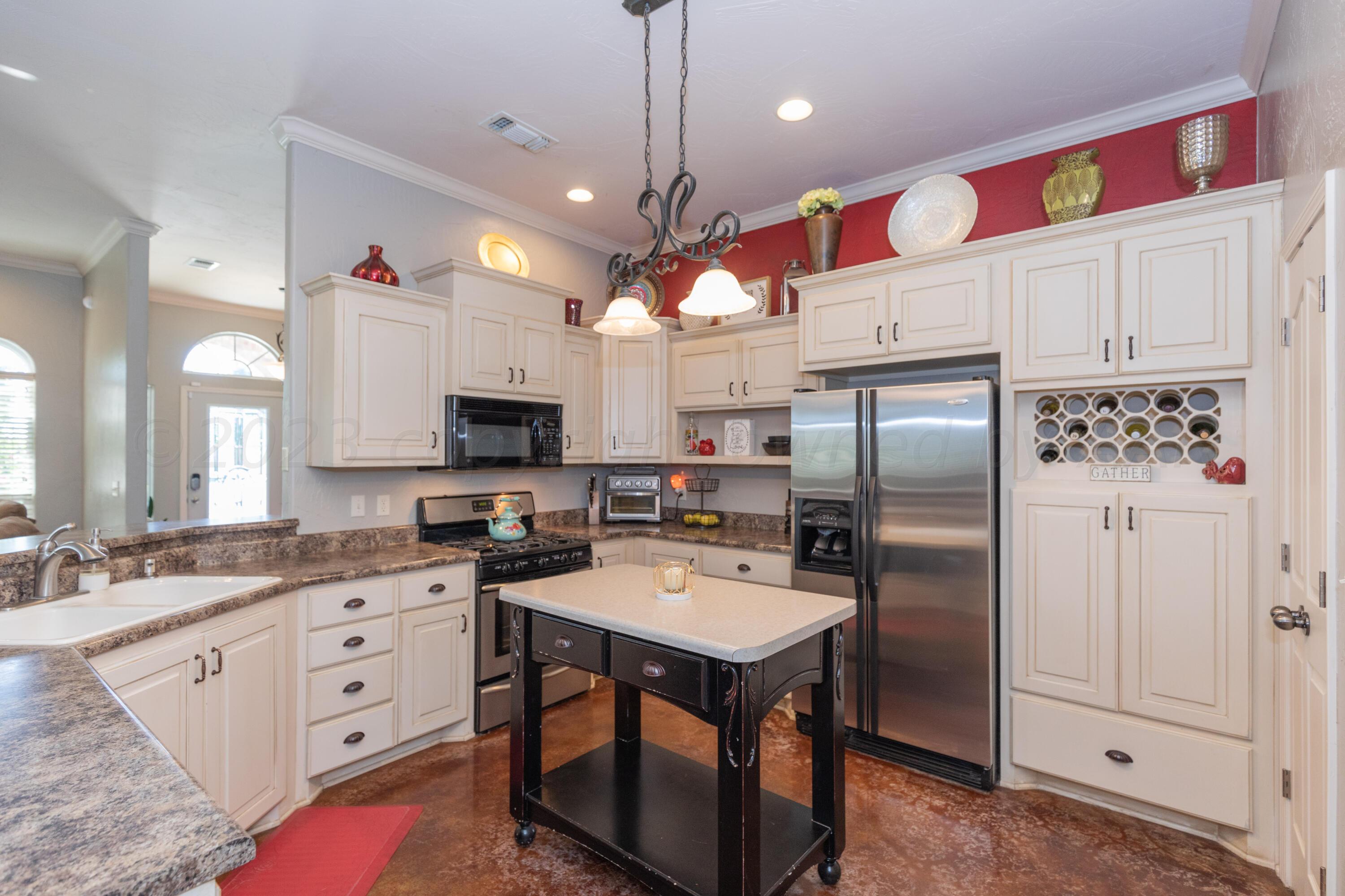 6916 Thunder Road Amarillo, TX 79119 - Photo 11 of 35 KITCHEN VIEW 2