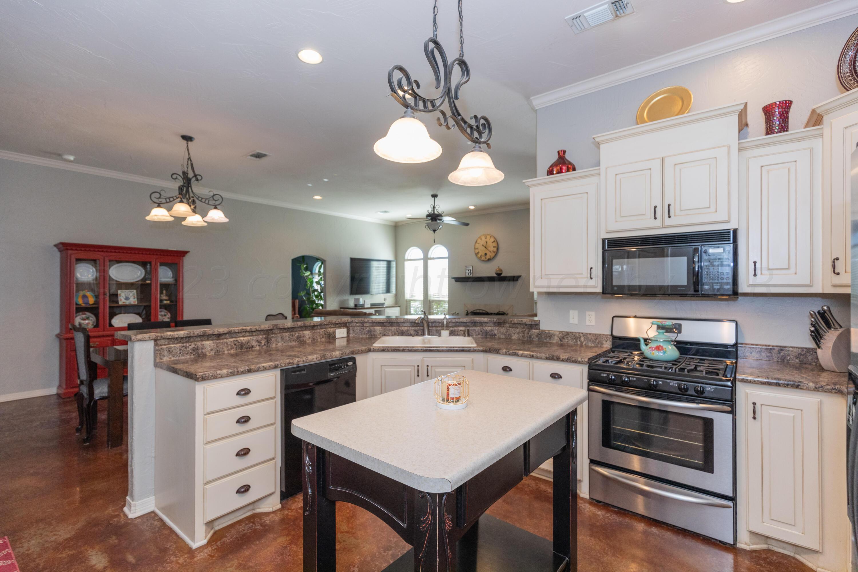 6916 Thunder Road Amarillo, TX 79119 - Photo 12 of 35 KITCHEN VIEW 3