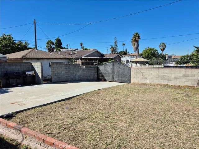 a front view of a house with parking space