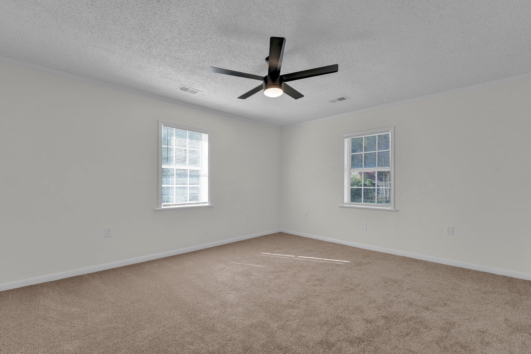 7829 Admiral Road Millington, TN 38053 - Photo 20 of 28 Carpeted empty room with a textured ceiling and ceiling fan