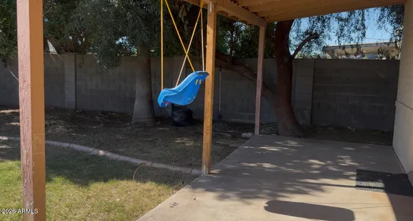 a view of a porch with a yard