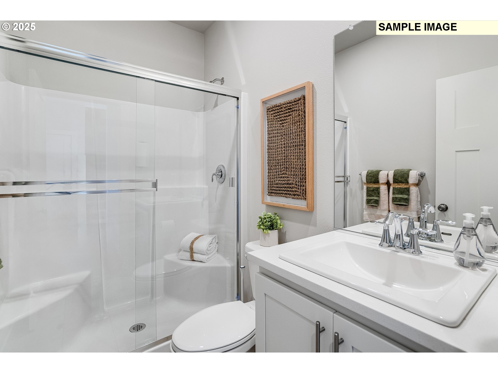 16698 Southwest Rubicon Lane Portland, OR 97224 - Photo 13 of 28 a bathroom with a sink a toilet a shower and a mirror