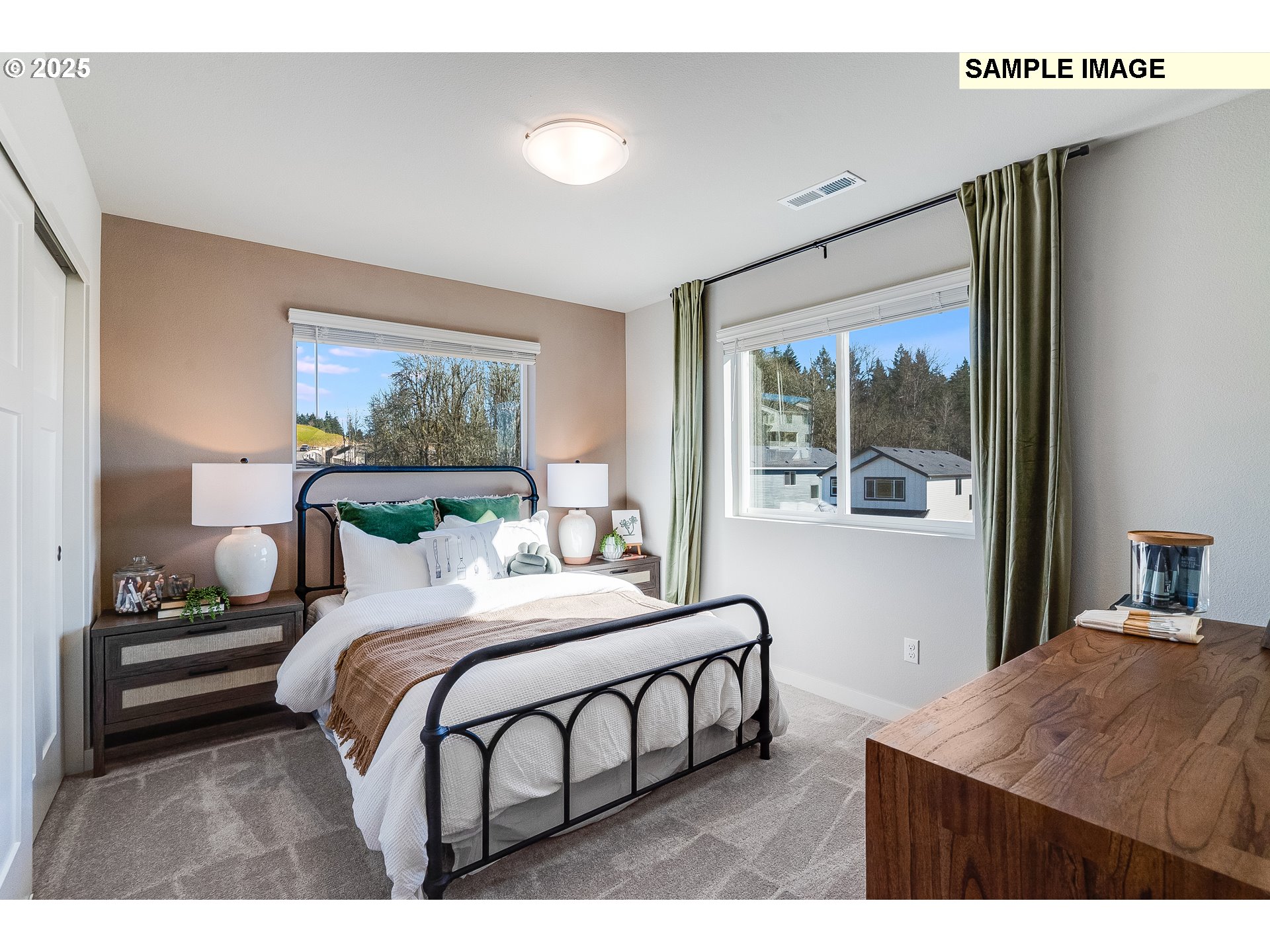 16698 Southwest Rubicon Lane Portland, OR 97224 - Photo 22 of 28 a bedroom with a large bed and a window