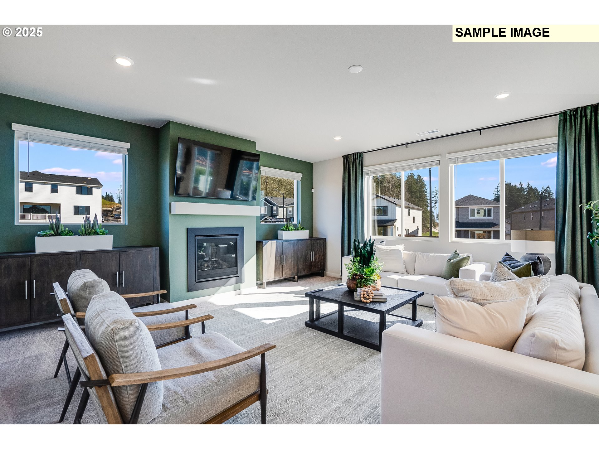 16698 Southwest Rubicon Lane Portland, OR 97224 - Photo 9 of 28 a living room with furniture a large window and a fireplace