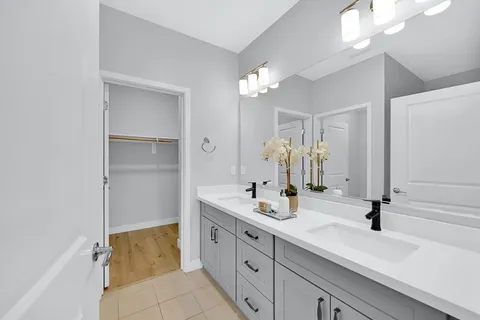 a bathroom with a sink a toilet and a bathtub