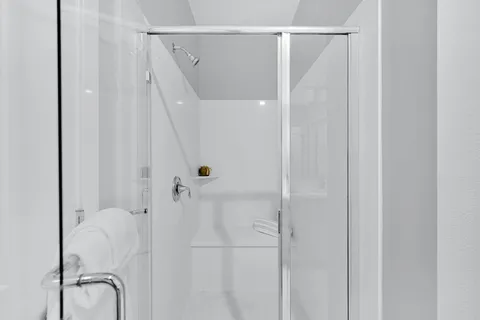 a bathroom with a sink a mirror and vanity