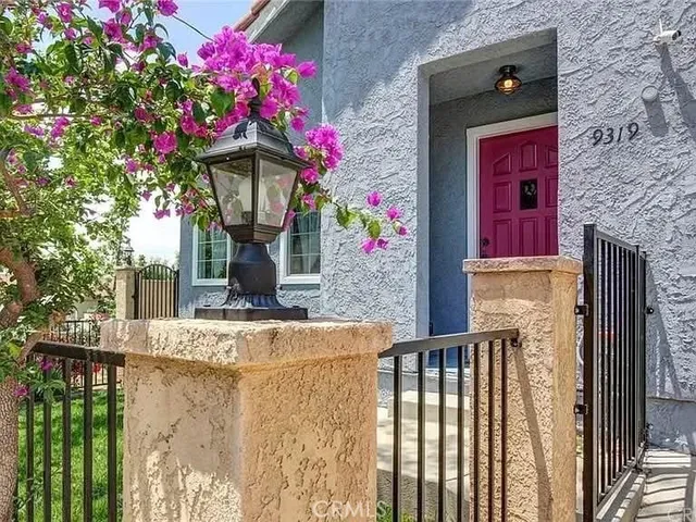 a front view of a house with a porch