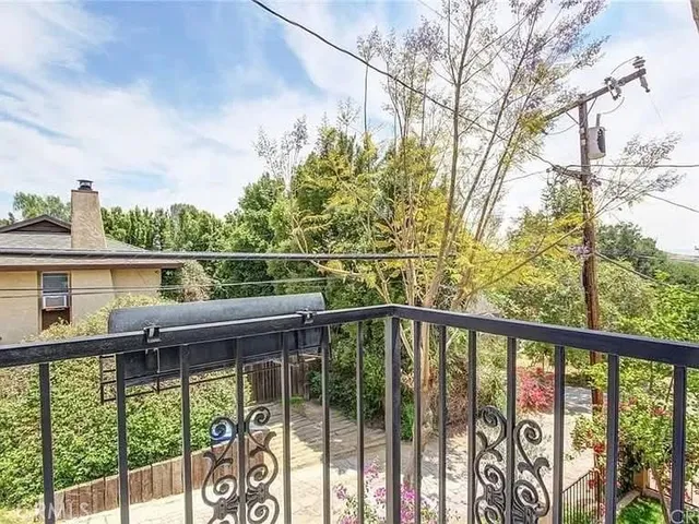 a view of a balcony with lake view