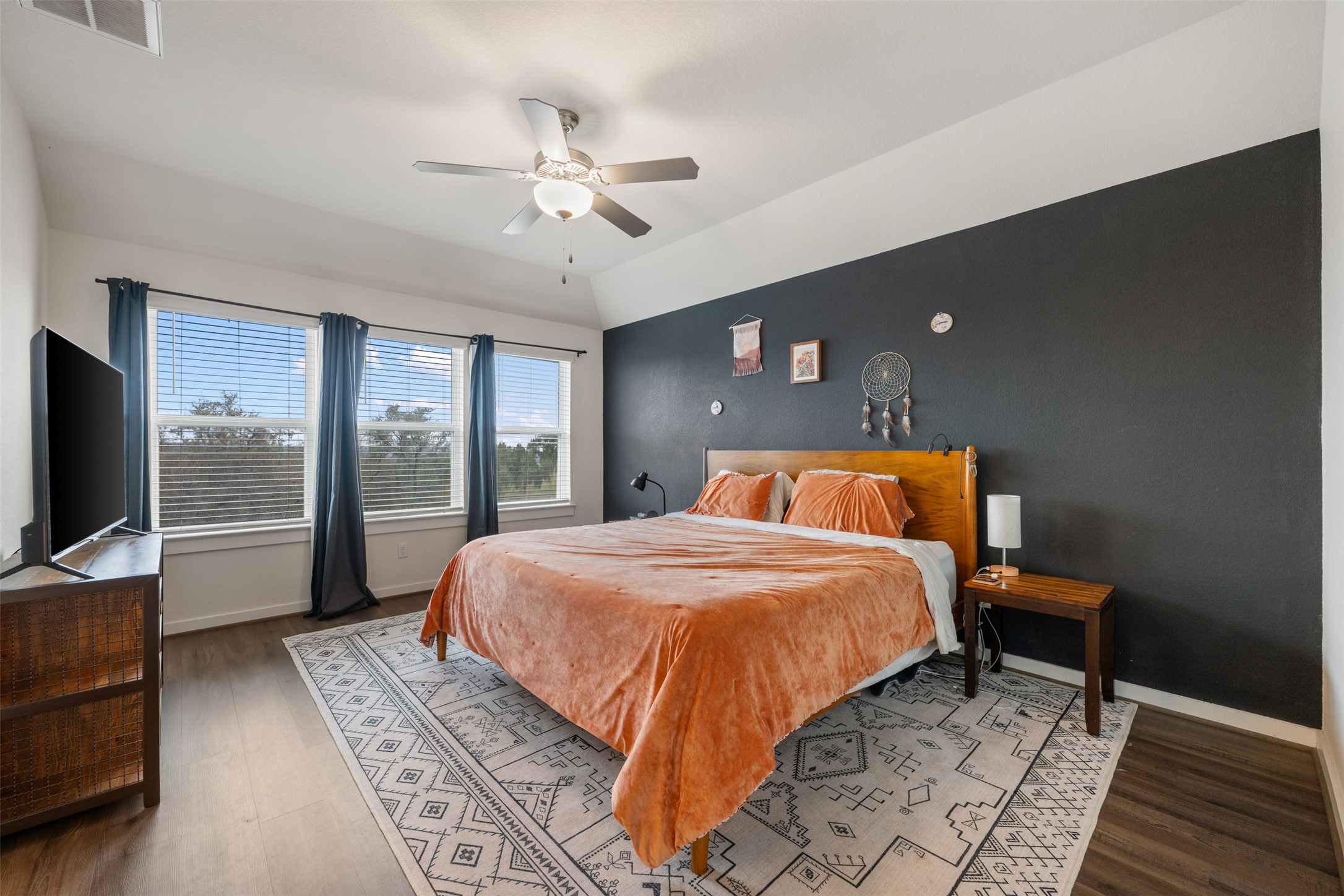 8204 Prairie Rye Drive Lago Vista, TX 78645 - Photo 17 of 39 Spacious primary bedroom with views of greenbelt.