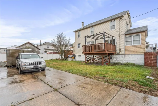 a car parked in front of a house