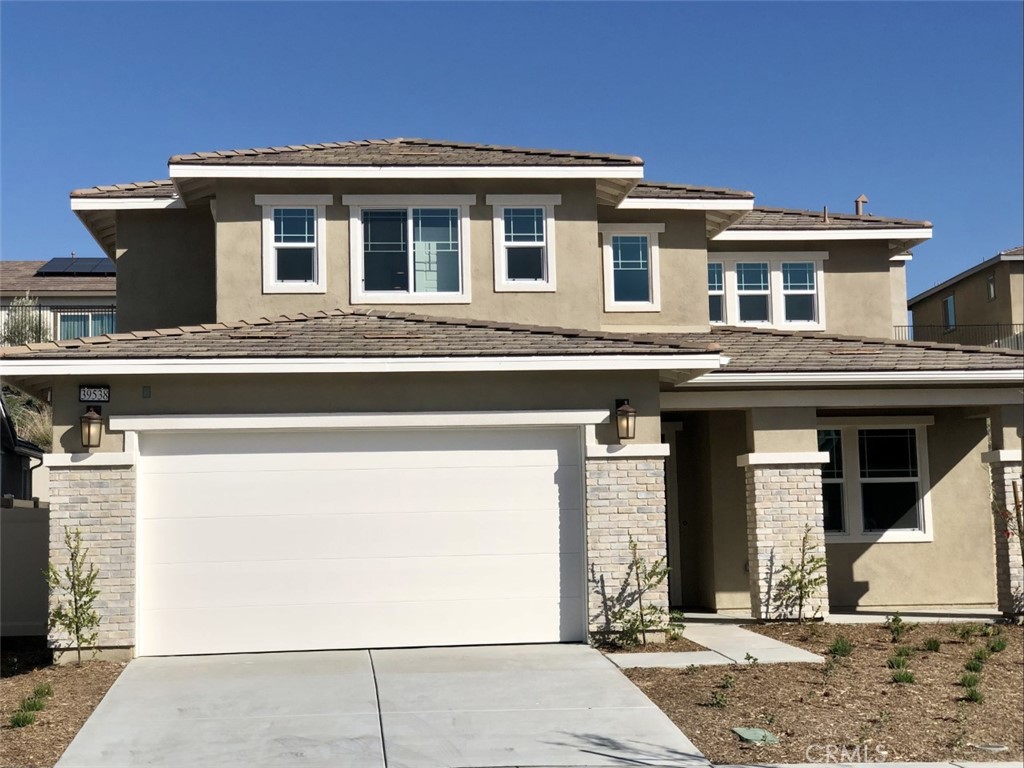 39538 Verbena Way Temecula, CA 92591 - Photo 1 of 38 a front view of a house with a porch