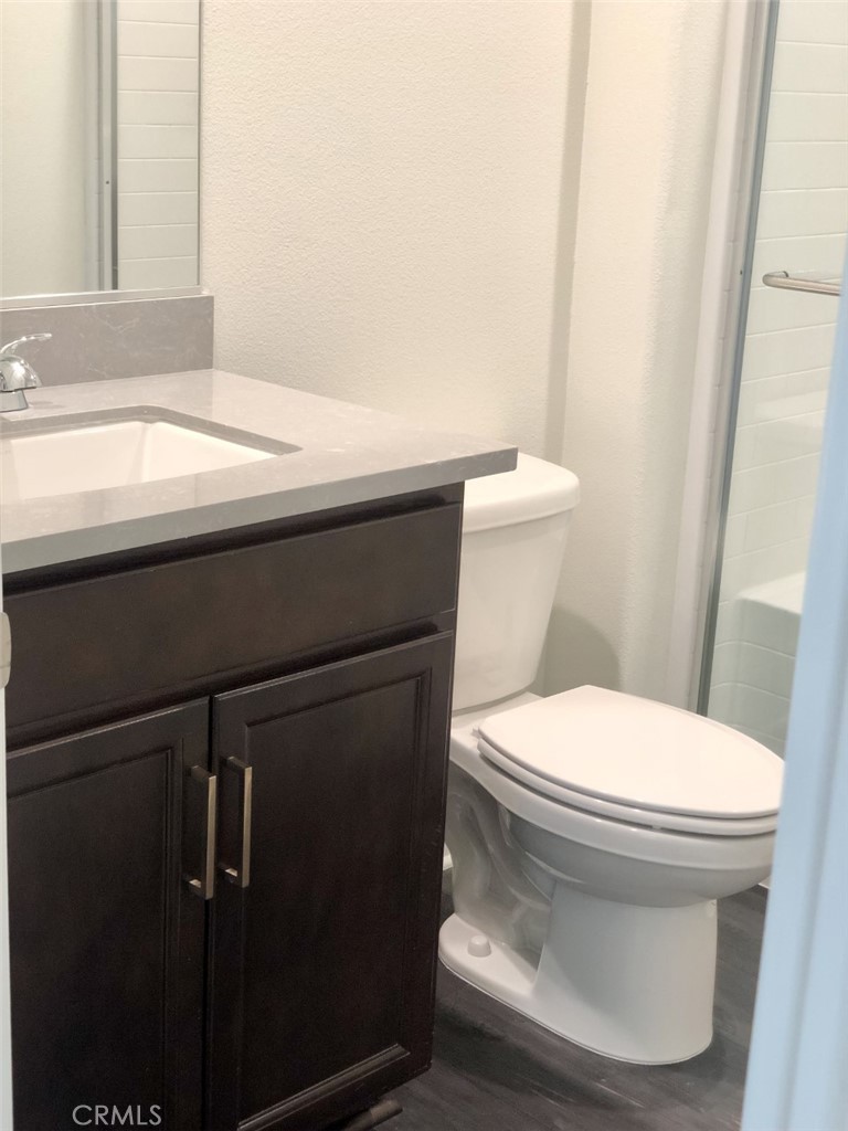 39538 Verbena Way Temecula, CA 92591 - Photo 14 of 38 a bathroom with a sink and a toilet