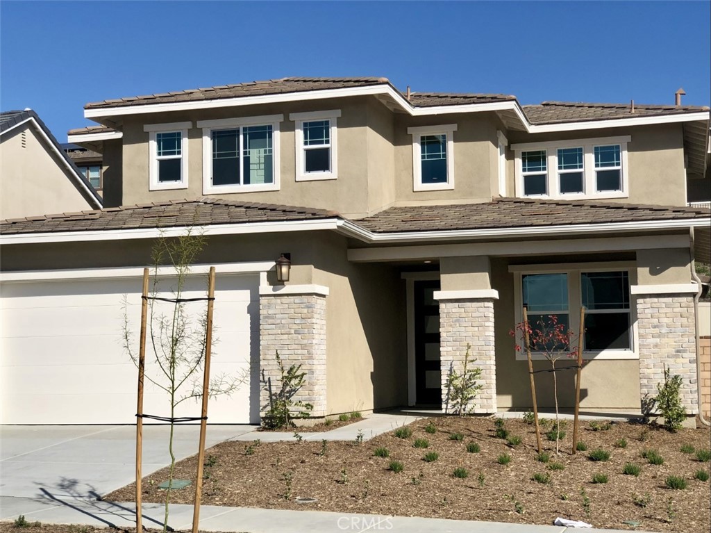 39538 Verbena Way Temecula, CA 92591 - Photo 2 of 38 a front view of a house with a yard