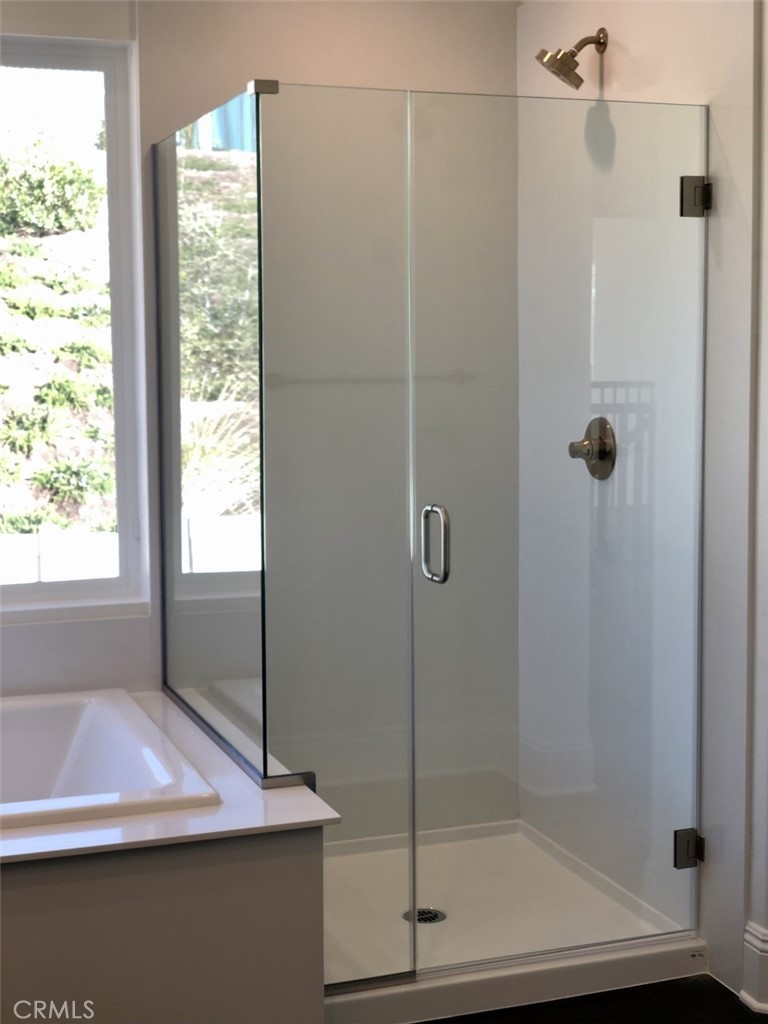 39538 Verbena Way Temecula, CA 92591 - Photo 22 of 38 a bathroom with a shower