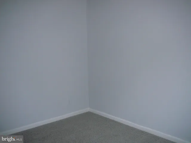 a room that has a white wall