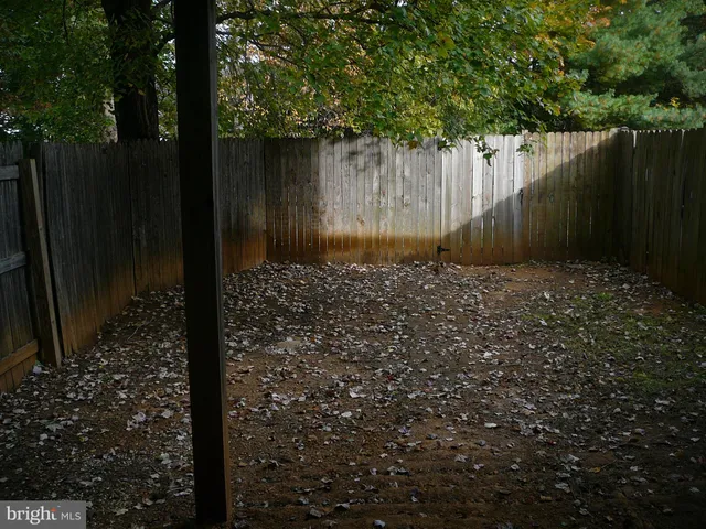 a view of backyard with green space