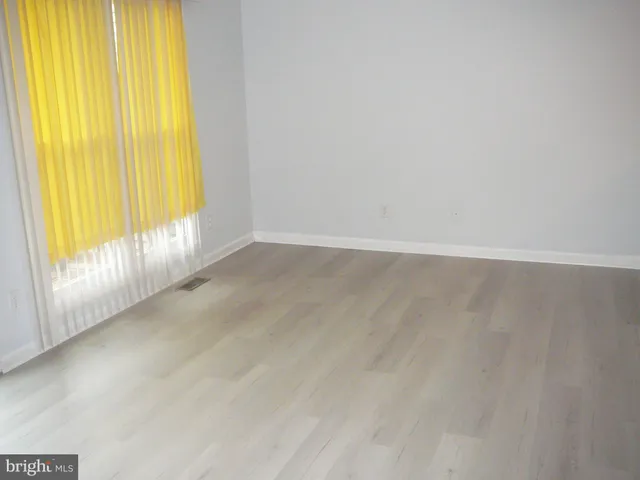 an empty room with window