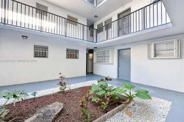 a front view of a building with street view