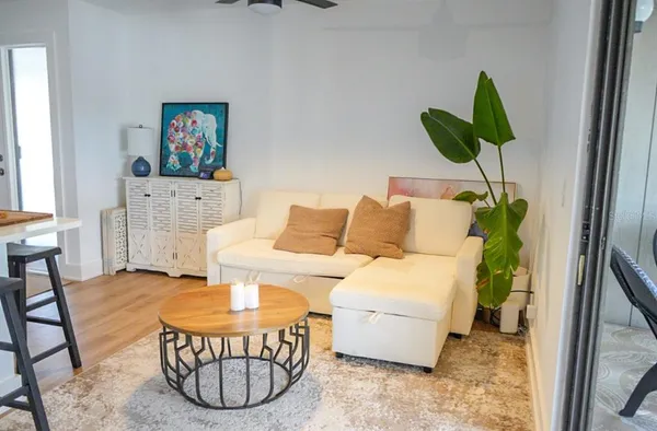 a living room with furniture and a couch