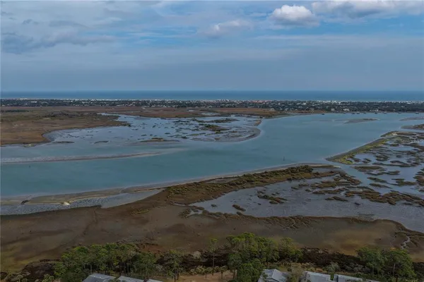 an aerial view of beach and ocean
