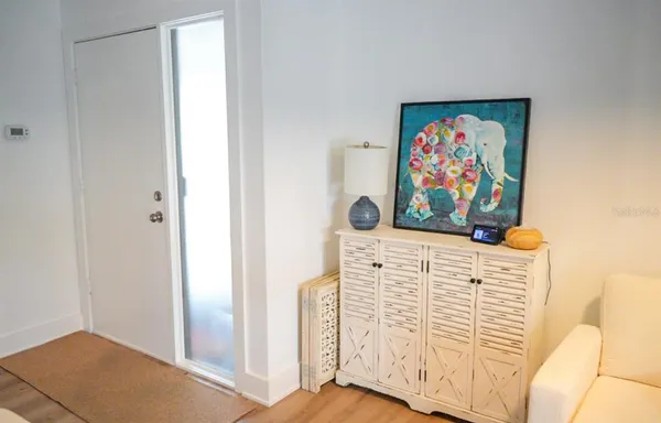 a view of front door with furniture