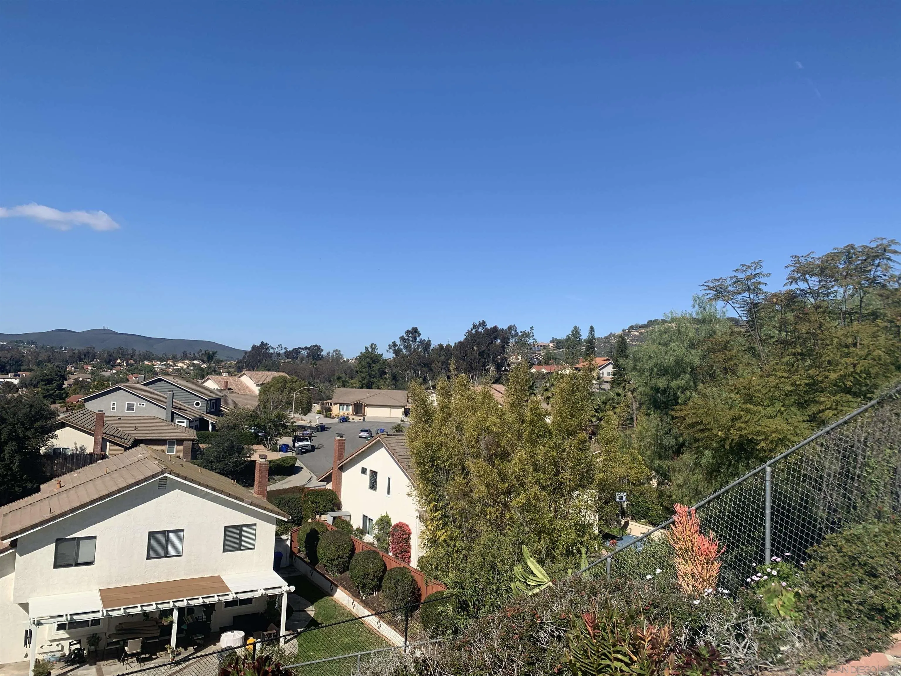 14738 Dash Way Poway, CA 92064 - Photo 2 of 4 a view of a house with a big yard