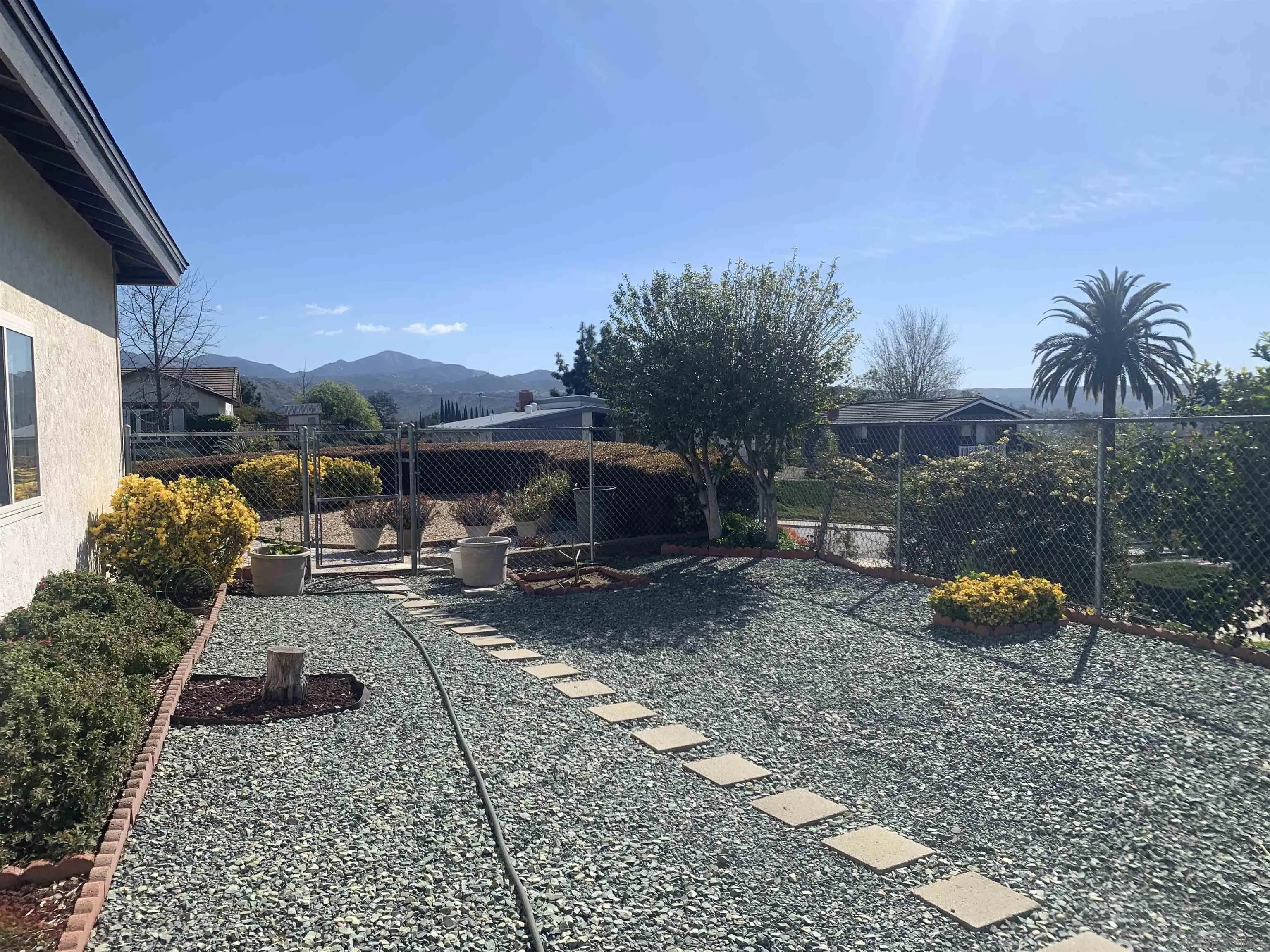 14738 Dash Way Poway, CA 92064 - Photo 4 of 4 a view of a backyard with sitting area