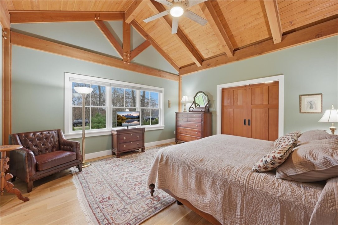 18 Fallon Trail Westerly, RI 02891 - Photo 17 of 31 1st floor master bedroom with timber frame vaulted ceilings.