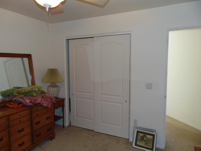 3545 East Rimrock Drive Rimrock, AZ 86335 - Photo 11 of 19 a bedroom with a bed and a window