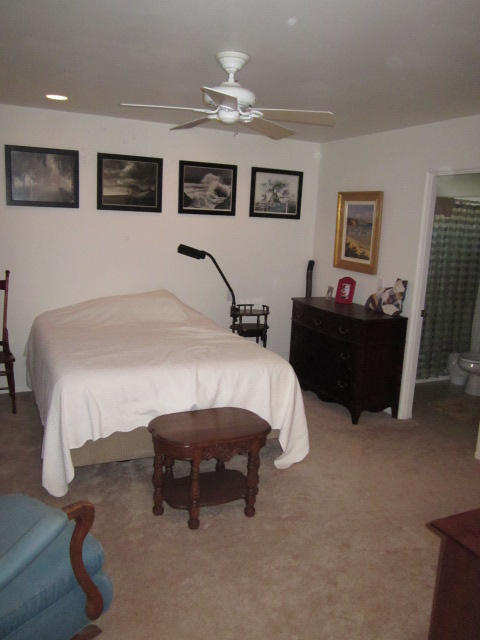 3545 East Rimrock Drive Rimrock, AZ 86335 - Photo 13 of 19 a bed room with a bed and a television