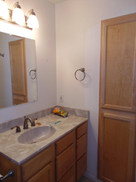 3545 East Rimrock Drive Rimrock, AZ 86335 - Photo 14 of 19 a bathroom with a sink and a mirror