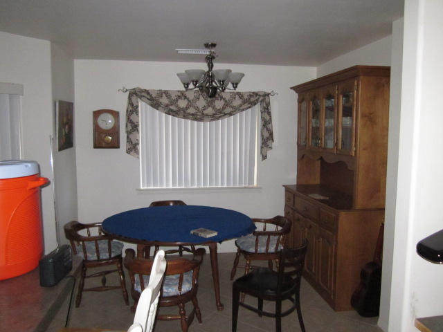 3545 East Rimrock Drive Rimrock, AZ 86335 - Photo 5 of 19 a view of a dining room with furniture and window