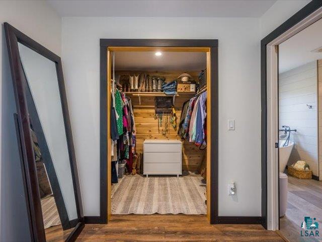 5508 Nordling Road Duluth, MN 55804 - Photo 15 of 58 Spacious closet with dark wood-style floors