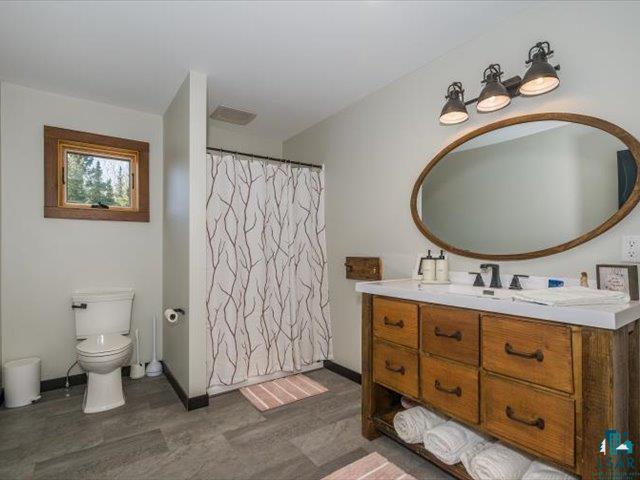 5508 Nordling Road Duluth, MN 55804 - Photo 27 of 58 Full bathroom with vanity and curtained shower