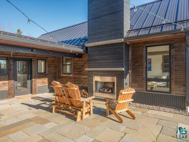 5508 Nordling Road Duluth, MN 55804 - Photo 54 of 58 View of patio with exterior fireplace