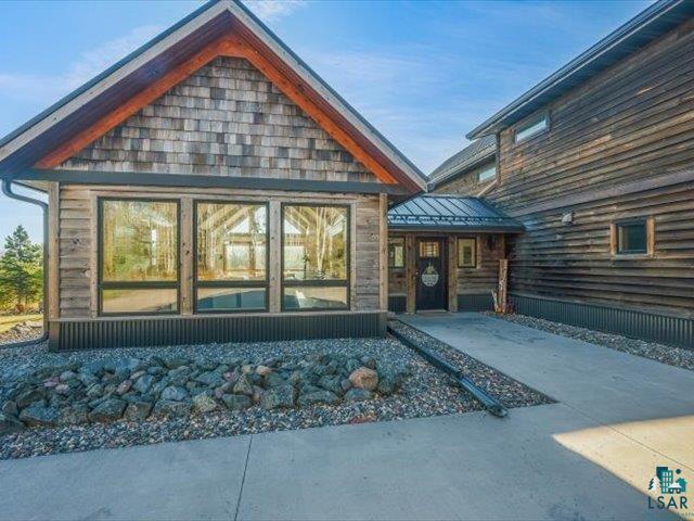 5508 Nordling Road Duluth, MN 55804 - Photo 57 of 58 Entrance to property featuring a metal roof and a standing seam roof