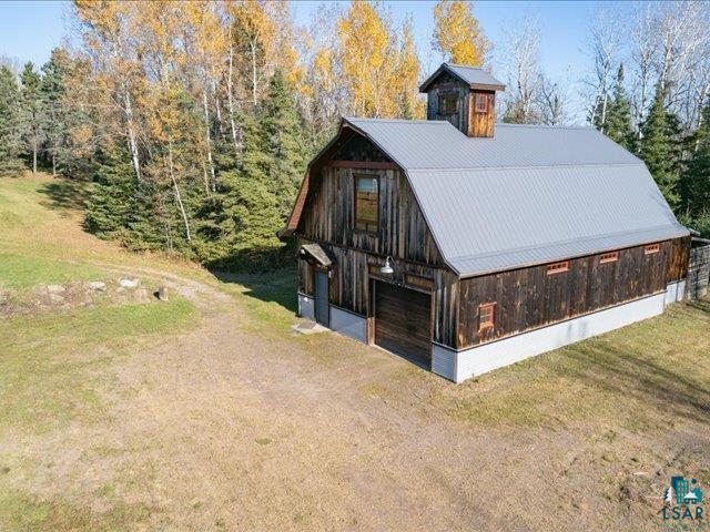 5508 Nordling Road Duluth, MN 55804 - Photo 6 of 58 View of barn featuring driveway and a lawn