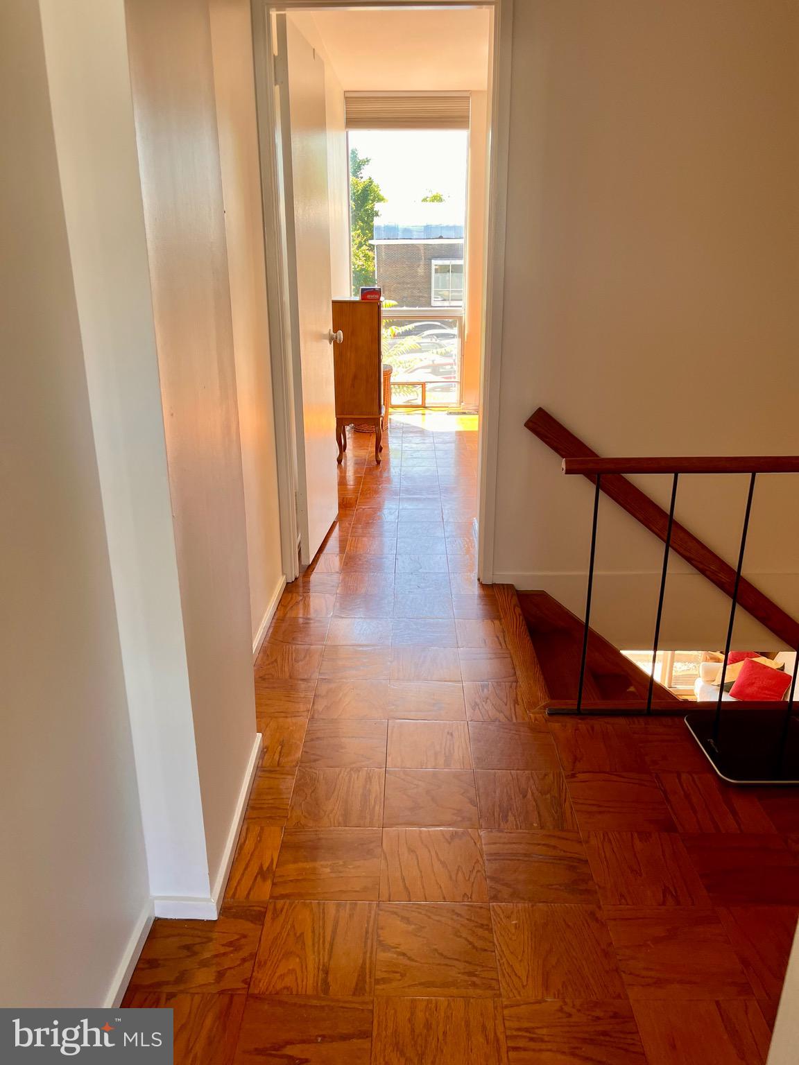 1340 4th Street Southwest, Unit T1340 Washington, DC 20024 - Photo 13 of 40 a view of hallway with furniture and a window