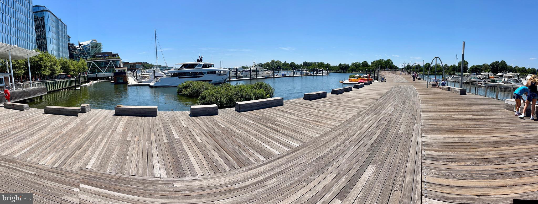 1340 4th Street Southwest, Unit T1340 Washington, DC 20024 - Photo 30 of 40 a view of a wooden deck with a lake view