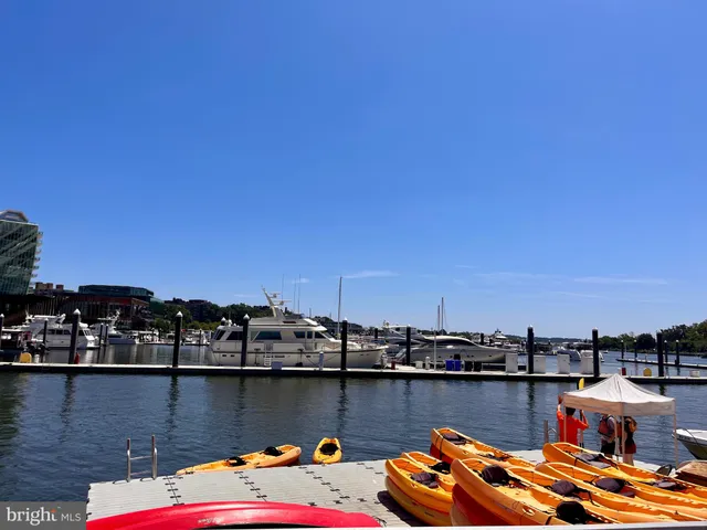 a view of a street with houses on both side